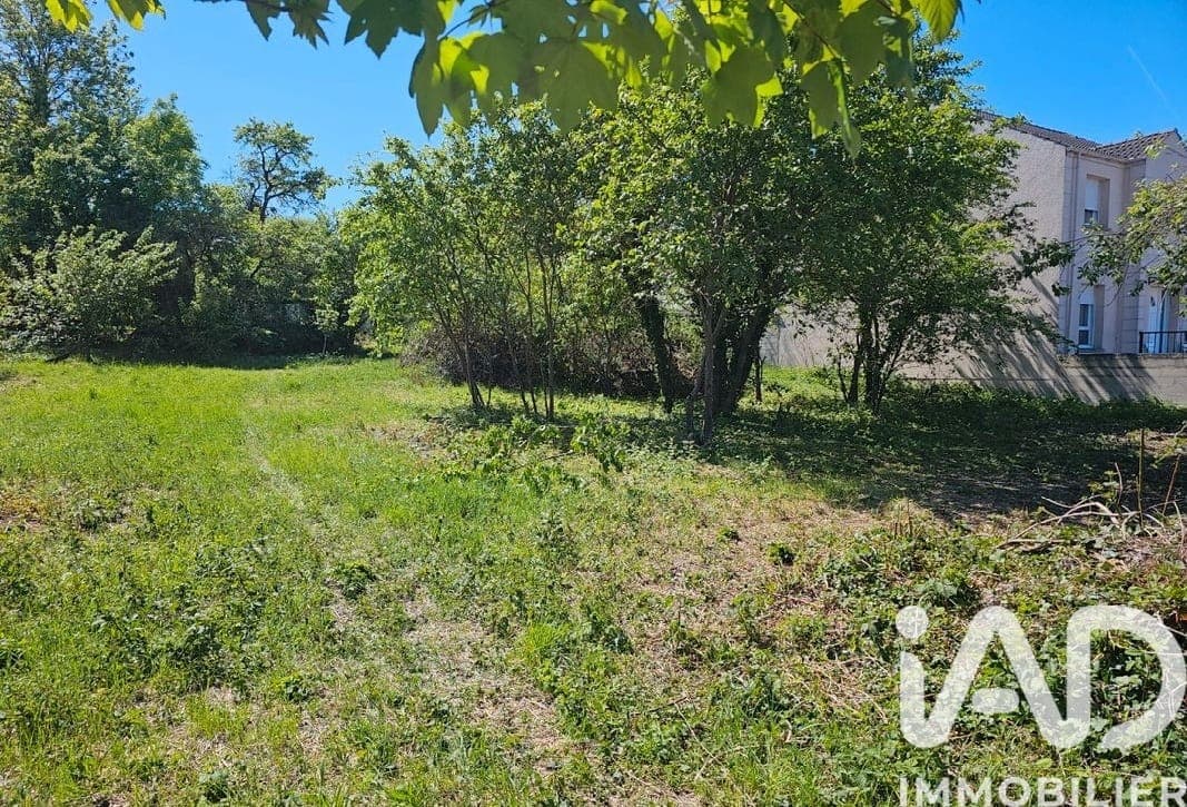Photo 2 de Terrain · 400 m²